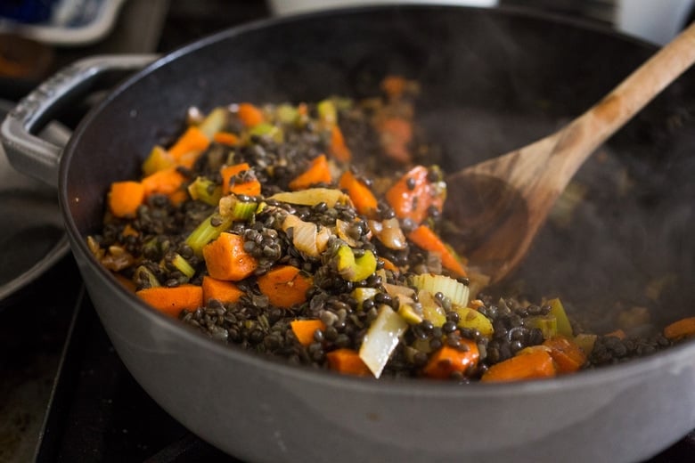 Indian-Spiced Shepherd's Pie with lentils, veggies and fragrant Garam Masala, topped with curry mashed potatoes. Truly one of the most delicious vegetarian recipes on the blog! #sheperdspie #vegetarianshepherdspie #indianrecipes #garammasala #lentils #vegetariandinner