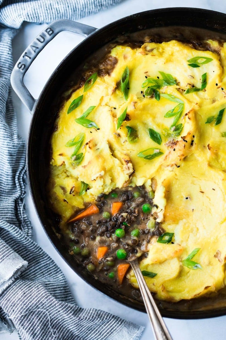 Vegetarian Shepherd's Pie infused with the most fragrant Indian spices, along with black lentils, veggies, gravy and topped with curried mashed potatoes. 