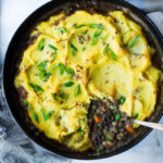 Indian-Spiced, Vegetarian Shepherd's Pie with lentils, veggies and fragrant Garam Masala, topped with curry mashed potatoes. Truly one of the most delicious vegetarian recipes on the blog! #sheperdspie #vegetarianshepherdspie #indianrecipes #garammasala #lentils #vegetariandinner