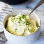 Easy Instant Pot Mashed Potatoes- creamy, fluffy and light and can be made in 20 minutes! Boost their flavor with roasted garlic, goat cheese, or horseradish! Up to you! Vegan adaptable and gluten free! #mashedpotatoes #instantpot #sides #thanksgivingsides #sidedishes #veganmashedpotatoes