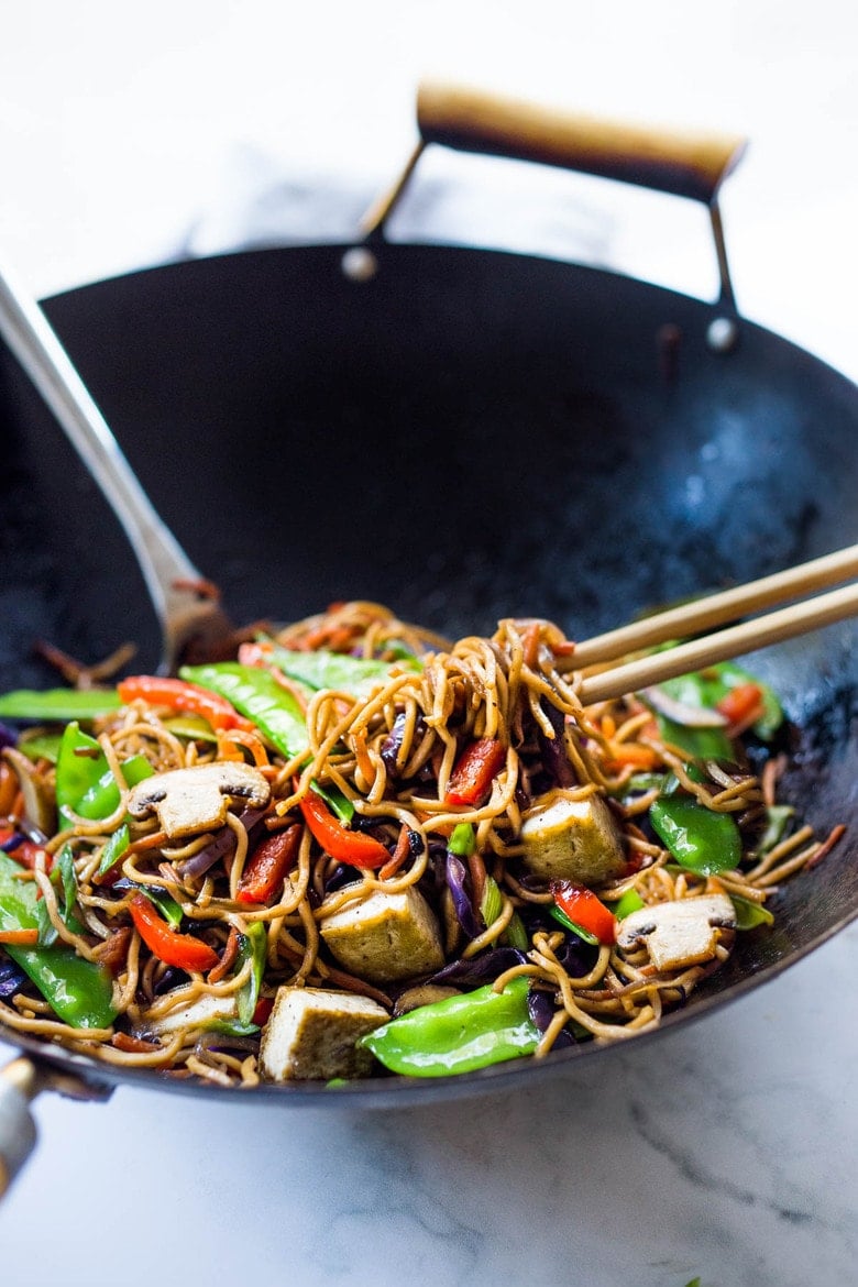 Veggie Lo Mein! On the table in under 20 minutes! Loaded up with healthy veggies, this VEGAN dinner recipe is fast and easy, perfect for busy weeknights! #lomein #lomeinnoodles #vegandinner #veganrecipes #veganlomein #stirfry