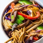 Easy Lo Mein! On the table in under 20 minutes! Loaded up with healthy veggies, this VEGAN dinner recipe is fast and easy, perfect for busy weeknights!