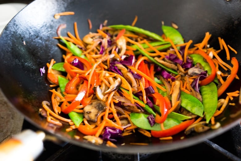 Veggie Lo Mein! On the table in under 20 minutes! Loaded up with healthy veggies, this VEGAN dinner recipe is fast and easy, perfect for busy weeknights! #lomein #lomeinnoodles #vegandinner #veganrecipes #veganlomein #stirfry