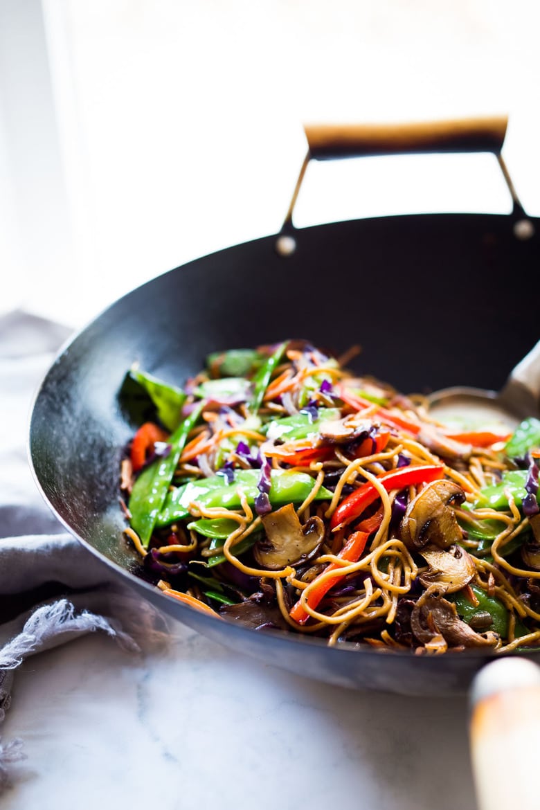 Veggie Lo Mein! On the table in under 20 minutes! Loaded up with healthy veggies, this VEGAN dinner recipe is fast and easy, perfect for busy weeknights! #lomein #lomeinnoodles #vegandinner #veganrecipes #veganlomein #stirfry