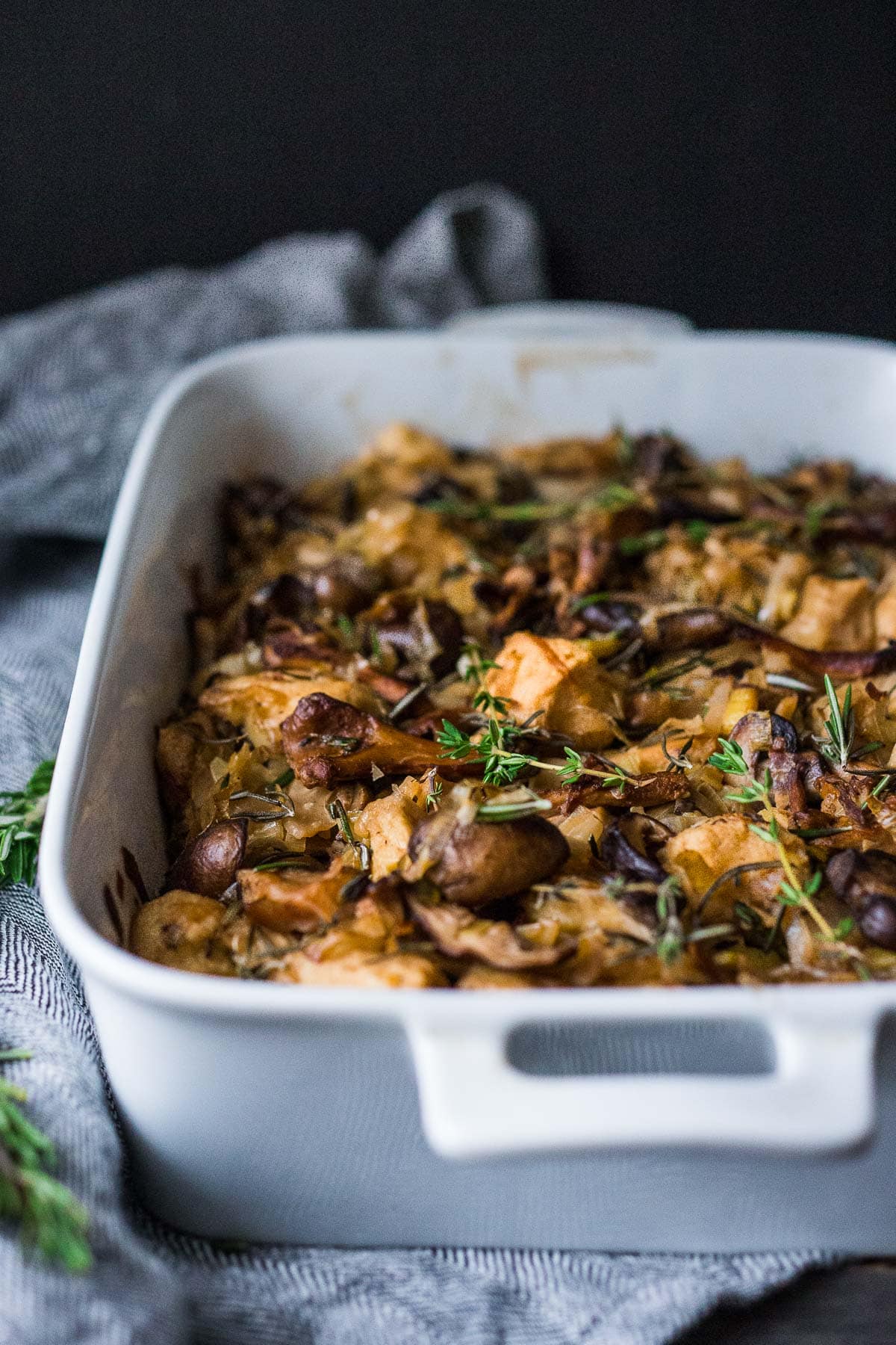 Packed full of mushrooms, leeks and thyme, this Mushroom Stuffing recipe is so savory and delicious! A tasty vegetarian side dish full of depth and umami flavor, perfect for the holiday table, or as a hearty vegetarian main. Vegan-adaptable!