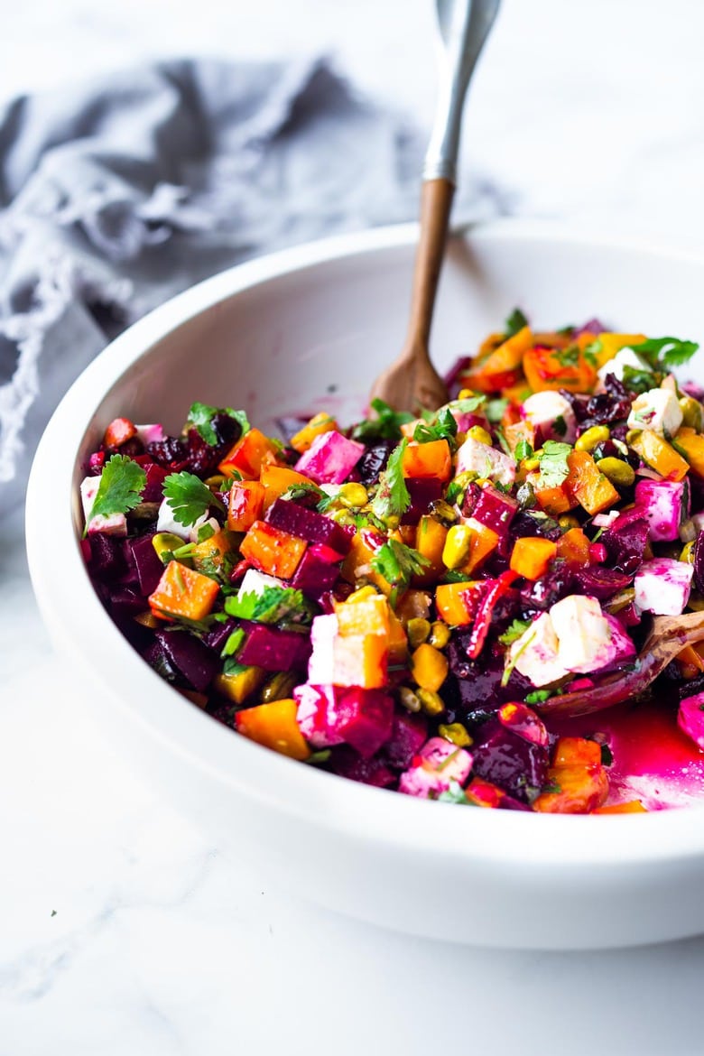 Beet Salad with pistachios, feta, cilantro and orange zest in a simple citrus vinaigrette. Can be made ahead and keeps for 3 days in the fridge. Perfect for special gatherings - and beautiful addition to the holiday table. 