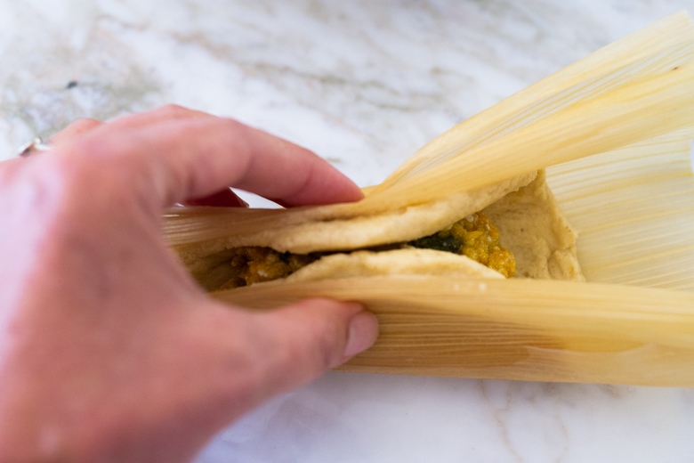 rolling the tamales.