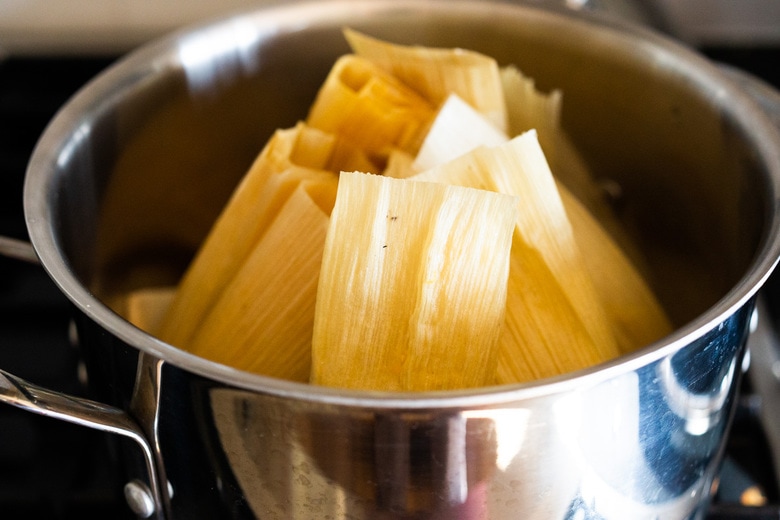 steaming tamales on the stove 
