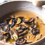 Creamy Mushroom Soup with Rosemary and Garlic - a delicious easy recipe that is Keto friendly and perfect for special  gatherings or simple enough for weeknight dinners! Serve this with crusty bread for a simple hearty meal!  #mushroomsoup #mushroomsouprecipe #mushroomrecipes #ketosoup