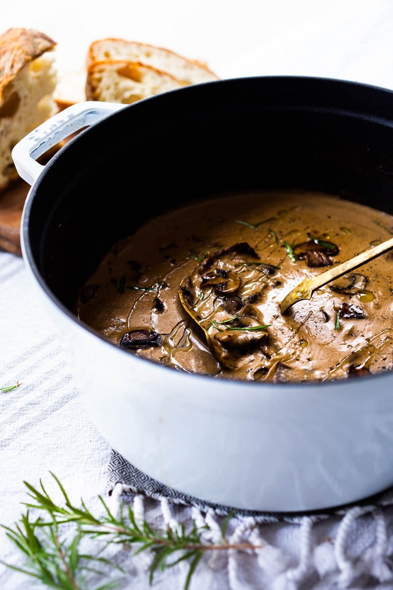 Mushroom Soup in a pot with a ladle.