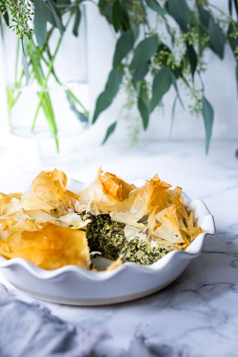 Spanakopita Pie - an easy, healthy recipe for spanakopita, with double the spinach filling, made in a pie pan! A delicious Greek-style lunch or brunch idea! Delicious served with a Simple Greek Salad! #spanakopita #spinachrecipes #phyllo #spanakopitapie #phyllodough