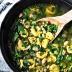 Brothy Tortellini soup with Spinach, Basil & White beans- a mouthwatering vegetarian soup that can be made in 25 minutes! #vegetarian #vegetariansoup #whitebeansoup #spinachsoup #tortellini #tortellinisoup