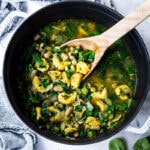 Brothy Tortellini soup with Spinach, Basil & White beans- a mouthwatering vegetarian soup that can be made in 25 minutes! #vegetarian #vegetariansoup #whitebeansoup #spinachsoup #tortellini #tortellinisoup