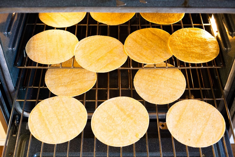 Making homemade tortilla chips for chilaquiles. 