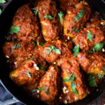 Turkish Stuffed Cabbage Rolls - filled with ground lamb, bulgar, pine nuts and fragrant spices, bathed in the most delicious Turkish Tomato Sauce. #cabbagerolls #stuffedcabbage #turkishcabbagerolls #turkishrecipes #lambrecipes #cabbagerecipes