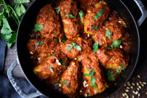 Turkish Stuffed Cabbage Rolls - filled with ground lamb, bulgar, pine nuts and fragrant spices, bathed in the most delicious Turkish Tomato Sauce. #cabbagerolls #stuffedcabbage #turkishcabbagerolls #turkishrecipes #lambrecipes #cabbagerecipes