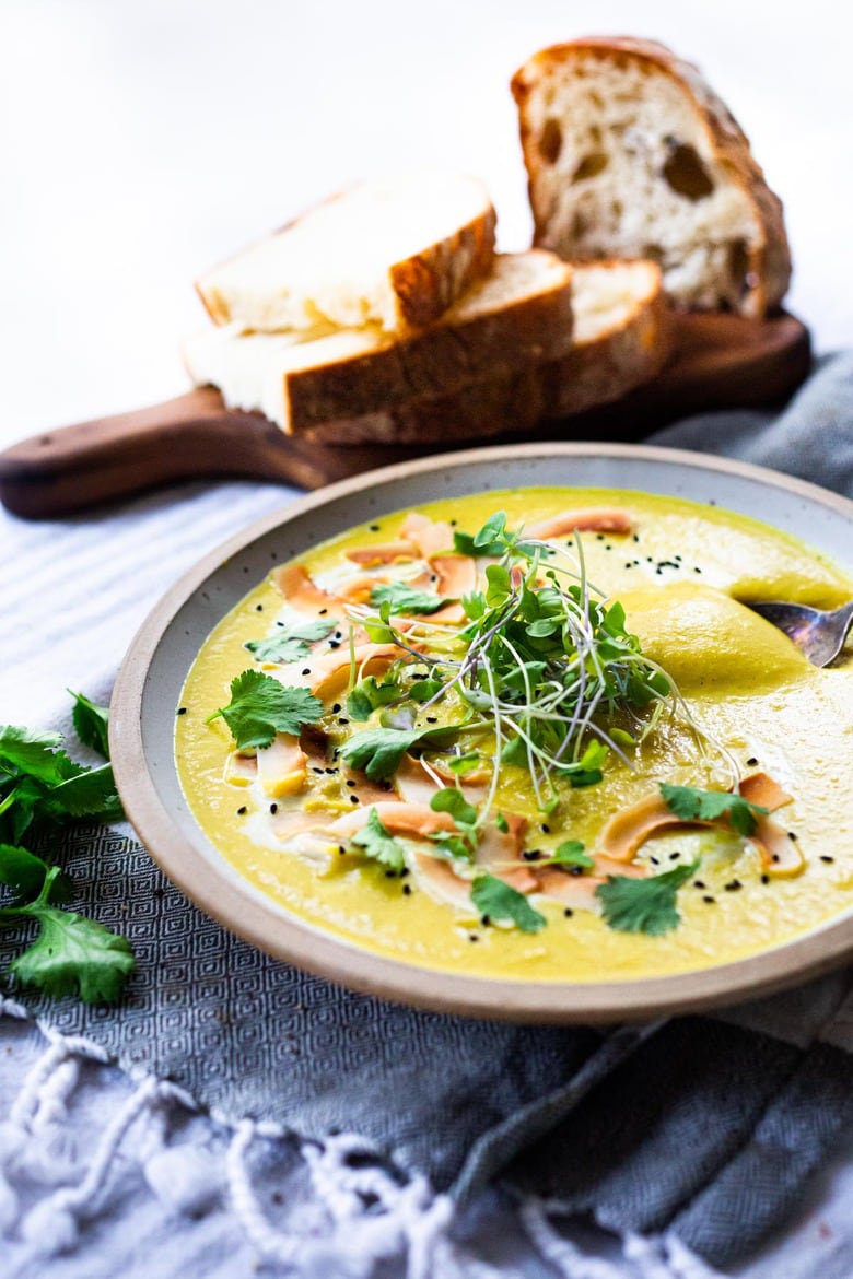 This Creamy Vegan Curried Cauliflower Soup with coconut milk, Indian spices, ginger and lime is simple and easy to make, and can be made in an Instant Pot (or on the stove top! Healthy and delicious! #vegan #vegansoup #instantpotsoup #cauliflowersoup #instantpot