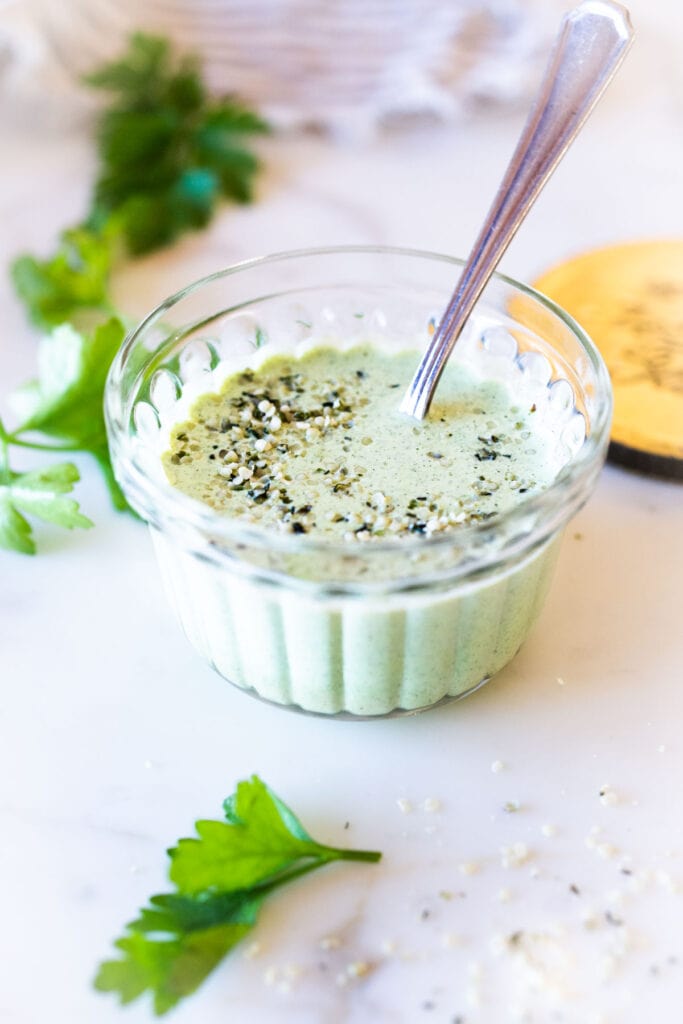 5-Minute Creamy Hemp Dressing is vegan, herby and delicious- an easy way to spice up your favorite salads and veggie platters! Make this with fresh dill, parsley or basil! Keto and vegan. #hempdressing #vegandressing #ketodressing #healthydressing #hemprecipes #hempseeds