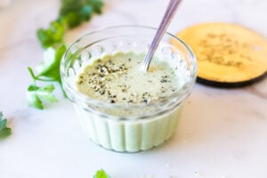 5-Minute Creamy Hemp Dressing is vegan, herby and delicious- an easy way to spice up your favorite salads and veggie platters! Make this with fresh dill, parsley or basil! Keto and vegan. #hempdressing #vegandressing #ketodressing #healthydressing #hemprecipes #hempseeds