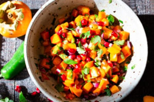 How to make the most delicious salsa in winter, using Fuyu Persimmons instead of tomatoes! Easy, quick and flavorful! Use this on fish tacos or like you would Pico de Gallo. #salsa #persimmons #persimmonrecipes #picodegallo