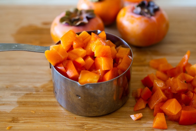 How to make the most delicious salsa in winter, using Fuyu Persimmons instead of tomatoes! Easy, quick and flavorful! Use this on fish tacos or like you would Pico de Gallo. #salsa #persimmons #persimmonrecipes #picodegallo 