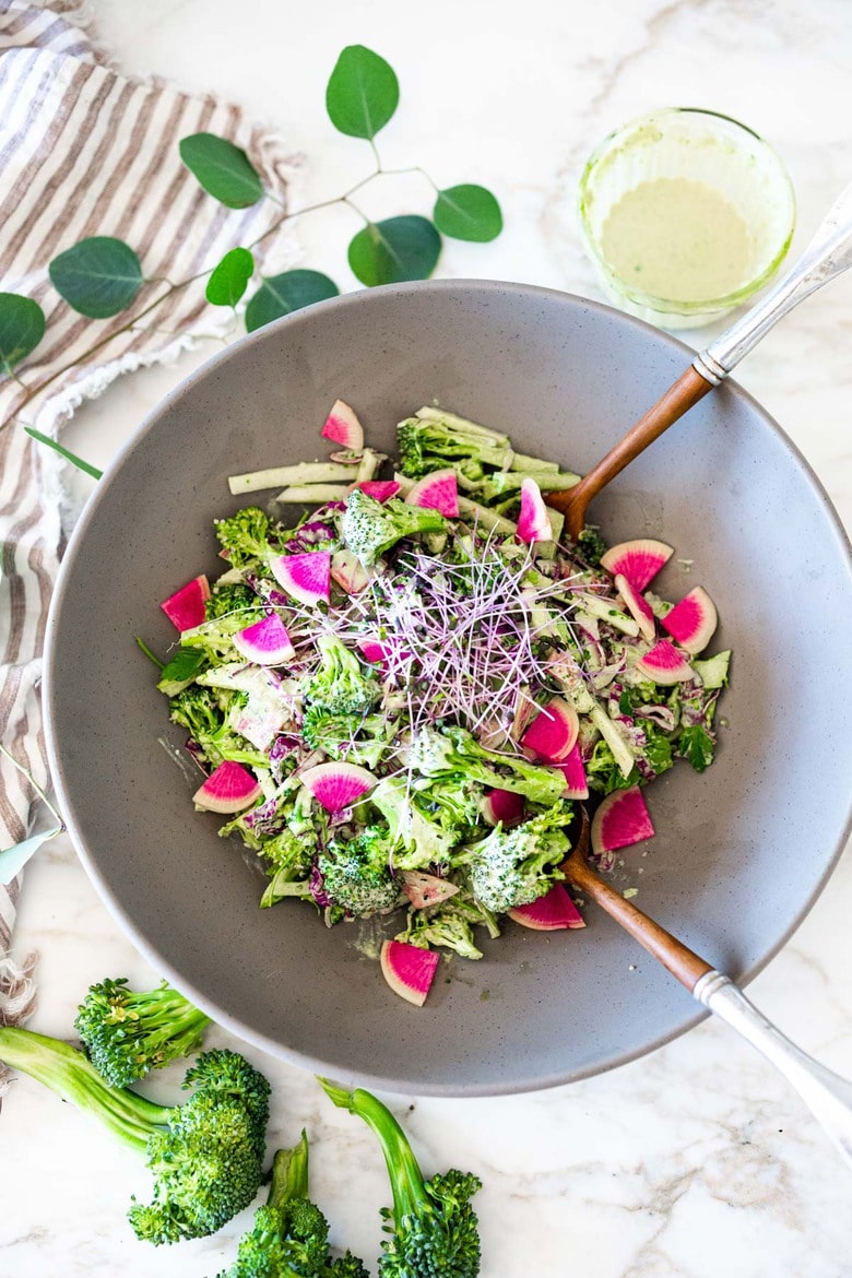 This Creamy Vegan Broccoli Salad is so good, you won't even realize it is vegan! Tossed in a creamy Hemp Dressing- it is easy, healthy and full of flavor! Vegan and Keto! #hempdressing #hemp #broccolisalad #keto #vegansalad #ketosalad 