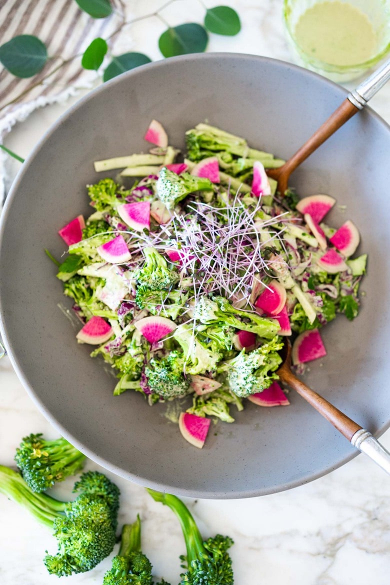 This Creamy Vegan Broccoli Salad is so good, you won't even realize it is vegan! Tossed in a creamy Hemp Dressing- it is easy, healthy and full of flavor! Vegan and Keto! #hempdressing #hemp #broccolisalad #keto #vegansalad #ketosalad