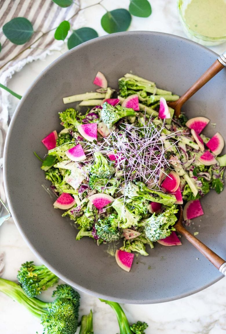 This Creamy Vegan Broccoli Salad is so good, you won't even realize it is vegan! Tossed in a creamy Hemp Dressing- it is easy, healthy and full of flavor! Vegan and Keto! #hempdressing #hemp #broccolisalad #keto #vegansalad #ketosalad