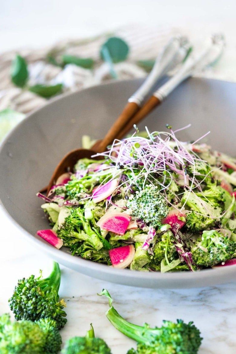 This Creamy Vegan Broccoli Salad is so good, you won't even realize it is vegan! Tossed in a creamy Hemp Dressing- it is easy, healthy and full of flavor! Vegan and Keto! #hempdressing #hemp #broccolisalad #keto #vegansalad #ketosalad 