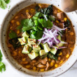 This Jackfruit Chili recipe is vegan and delicious! Made with white beans and green chilis, it can be made in an Instant Pot or on the stovetop. A fast and easy dinner recipe can be made in 30 minutes!