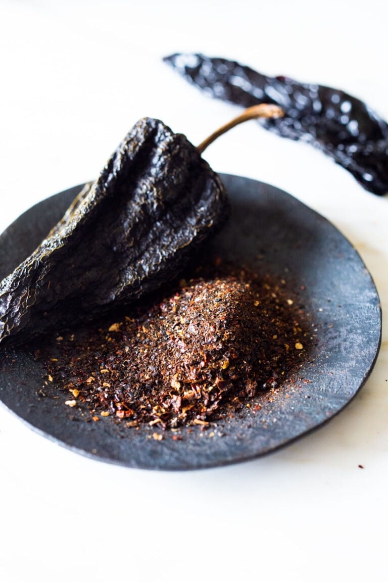 Spice up your next batch of Chili with Homemade Chili Seasoning! Made with simple spices you already have at home, this flavorful spice blend can be used on so many things- roasted potatoes, fish, chicken, or use as taco seasoning! #chiliseasoning #chili #spices #chilispice #tacoseasoning