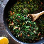 Simple Vegan Sautéed Greens- Kale and chard with garlic, shallots and lemon - a simple side dish that is vegan, low carb, Keto and full of healthy nutrients! Delicious flavor and can be made in 20 minutes! #sautéedkale #sautéedgreens, #wiltedkale, #ketosidedish, #vegansidedish,