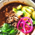 An authentic recipe for Birria, a flavorful Mexican Stew made with beef, lamb or goat that can be made in an Instant Pot, Dutch Oven or Slow Cooker. Serve this in a big bowl or make Birria Tacos - the best! #birria #birriatacos #mexicanstew #tacos