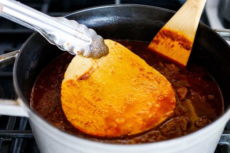 dip tortillas in the the birria broth