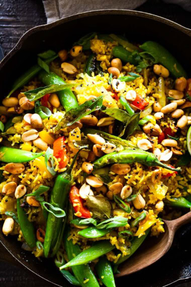 This vibrant, turmeric-spiced Indian Fried Rice is packed with colorful, nutrient-rich veggies and comes together in under 30 minutes. Vegetarian, gluten-free, and easily adaptable for a vegan diet, it’s a quick, wholesome, and flavorful weeknight meal that everyone will love.