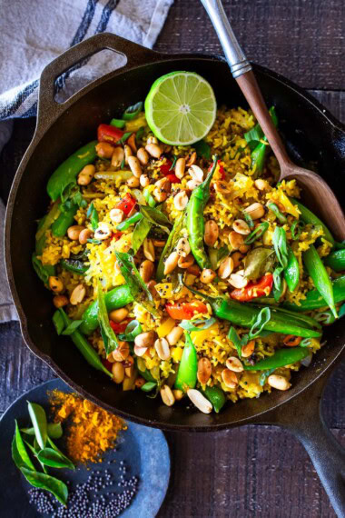 This vibrant, turmeric-spiced Indian Fried Rice is packed with colorful, nutrient-rich veggies and comes together in under 30 minutes. Vegetarian, gluten-free, and easily adaptable for a vegan diet, it’s a quick, wholesome, and flavorful weeknight meal that everyone will love.
