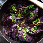 Slow Braised Cabbage - slow cooked in the oven until meltingly tender, topped with Gremolata. Vegan and Gluten-free. #cabbage #braisedcabbage