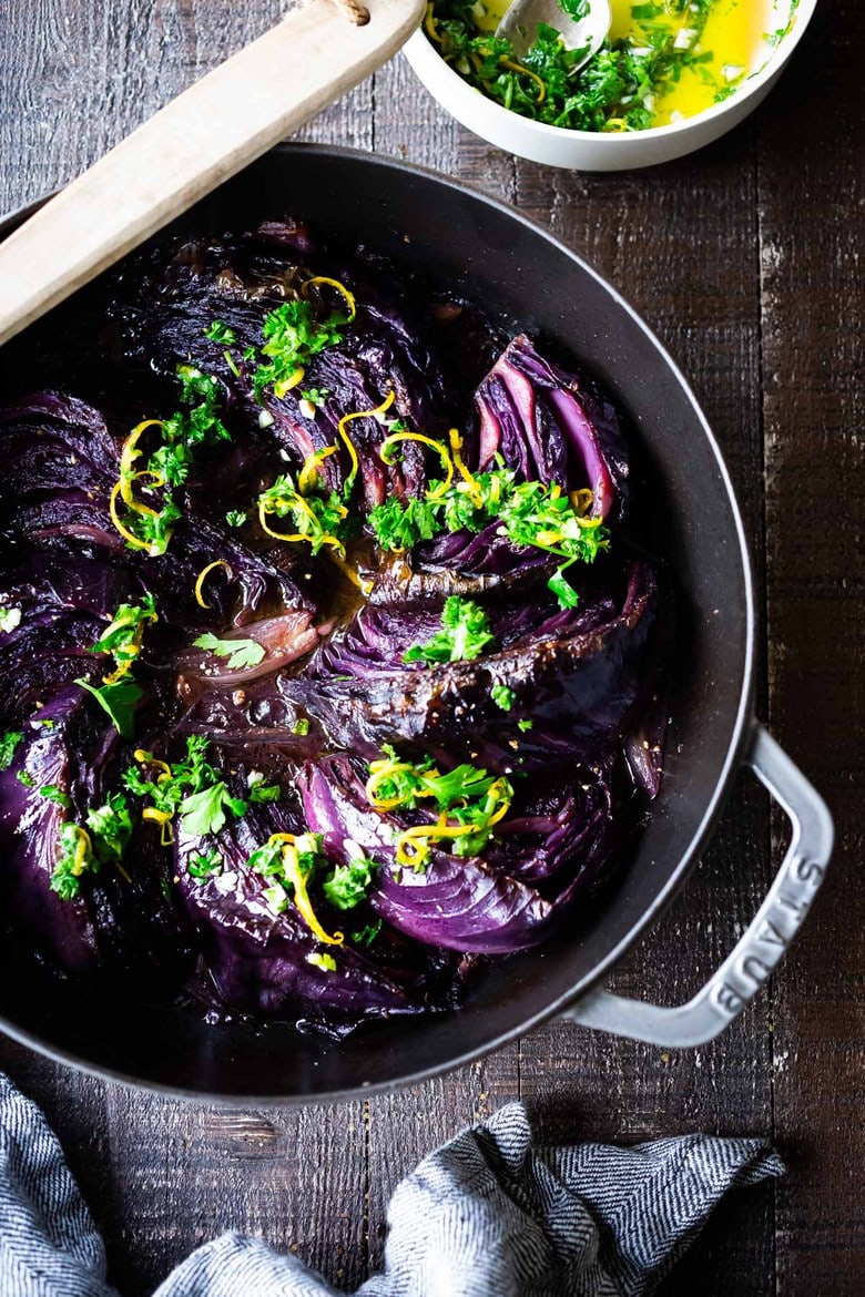 Slow Braised Cabbage - slow cooked in the oven until meltingly tender, topped with Gremolata. Vegan and Gluten-free. #cabbage #braisedcabbage