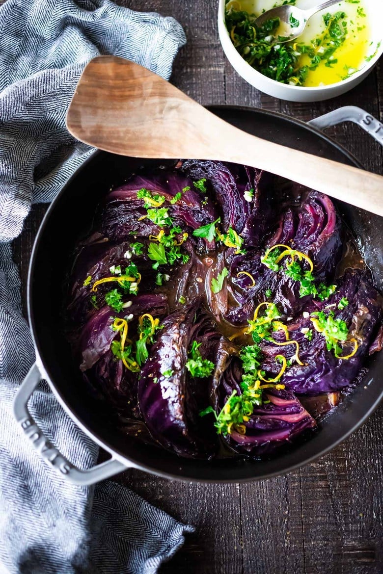 Slow Braised Cabbage - slow cooked in the oven until meltingly tender, topped with Gremolata. Vegan and Gluten-free. #cabbage #braisedcabbage
