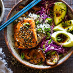 Here's a fast & healthy weeknight Dinner! Furikake Salmon Bowls- these delicious bowls are made with seared sesame salmon, shiitake mushrooms, avocado and cabbage. Make this in 30 minutes! #salmonbowl #keto #salmon #furikake