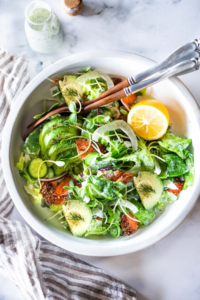 Smoked Salmon, Avocado and Fennel Salad with butter lettuce and creamy Dill Dressing. Fast and easy, this hearty entree salad makes for a delicious lunch or dinner main. #salad #salmonsalad