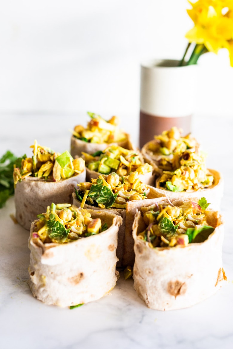 Vegan Curry Chickpea Wrap -A simple vegan recipe for Curry Chickpea Salad, wrapped up with spinach and sprouts. A healthy vegan lunch idea! #veganwrap #currychickpeawrap 