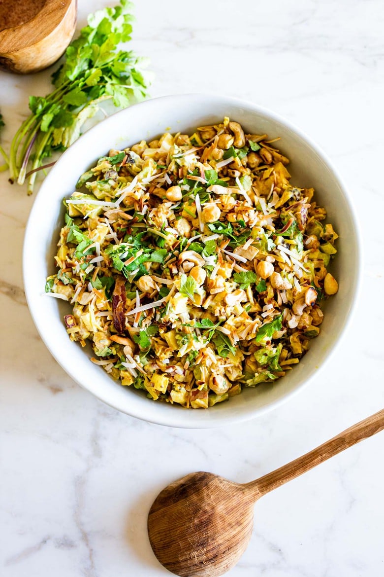 A simple vegan recipe for Curry Chickpea Salad, that can be turned into a wrap with spinach and sprouts. A healthy vegan lunch idea! #veganwrap #currychickpeawrap