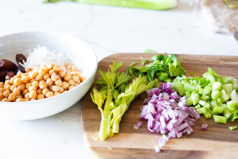 A simple vegan recipe for Curry Chickpea Salad, that can be turned into a wrap with spinach and sprouts. A healthy vegan lunch idea! #veganwrap #currychickpeawrap 