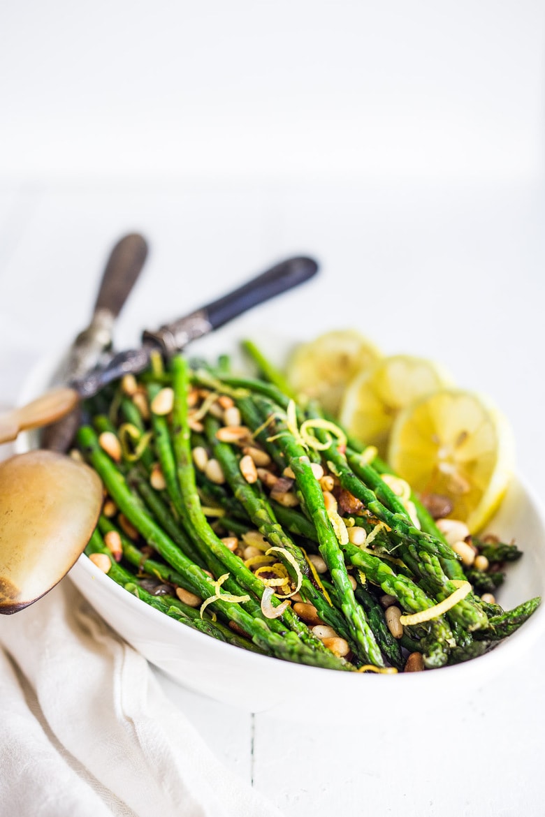 Simple Roasted Asparagus with olive oil, garlic, lemon zest, baked at 400F, in about 20 minutes. A fast, easy, healthy vegetable side dish that pairs with so many things!