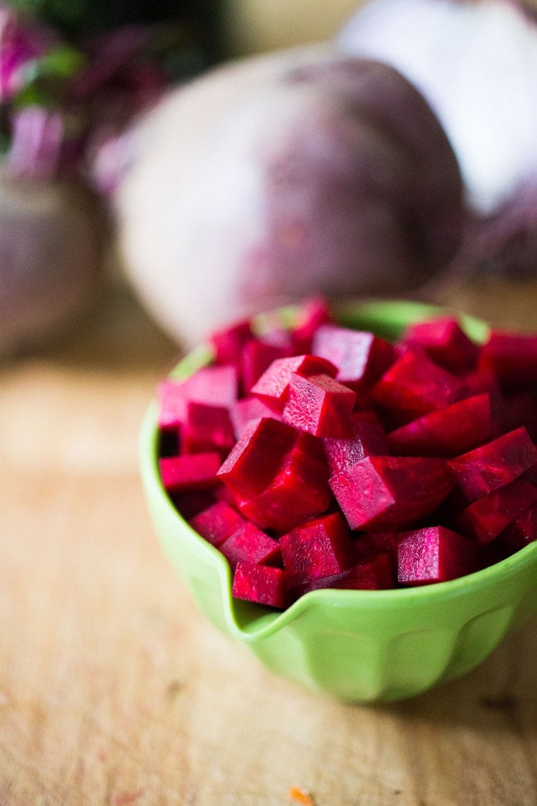 How to Make Beet Kvass! A sparkly Ukrainian probiotic drink made with beets, sea salt and water. Full of healthy probiotics from the Lacto-fermentation, Beet Kvass is believed to help boost immunity.  It tastes slightly sweet, tangy, earthy and salty- but in a good way! With just 10 minutes of hands-on time,it is so simple- just let mother nature take its course.  (Allow 2 weeks for fermentation- see notes for speeding up this process.)