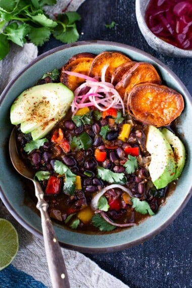 This tasty Cuban Black Bean Soup Recipe can be made with dry beans in your Instant Pot or cooked on the stovetop. Either way, you'll love the flavor of this vegan dinner recipe! (See notes for using canned beans.)