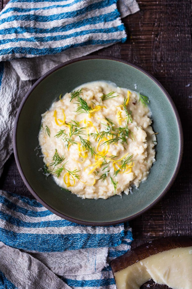 The EASIEST Risotto recipe made in your Instant Pot! This healthy low-maintenance risotto recipe will become your new favorite weeknight dinner. Fully customizable- add your favorite veggies like mushrooms, spinach, spring peas, asparagus, and have funs with this! #instantpot #risotto