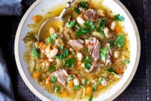 Brothy Leek, Lamb and Cabbage Soup with White beans- a delicious and healthy, soul-warming soup that can be made in an Instant Pot! #lambstew #instantpotrecipes