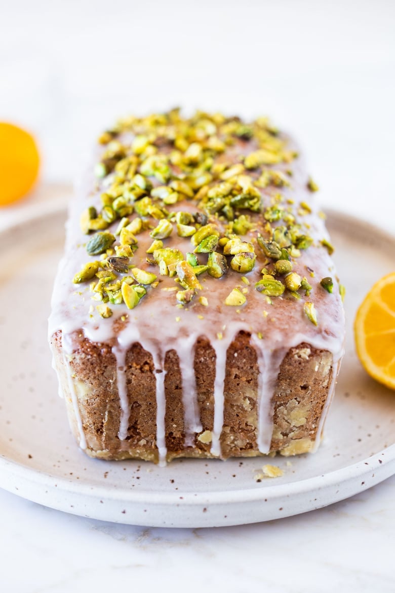 Meyer Lemon Loaf with Toasted Pistachios and Lemony Glaze. The perfect balance between tart and sweet. #lemonloaf 